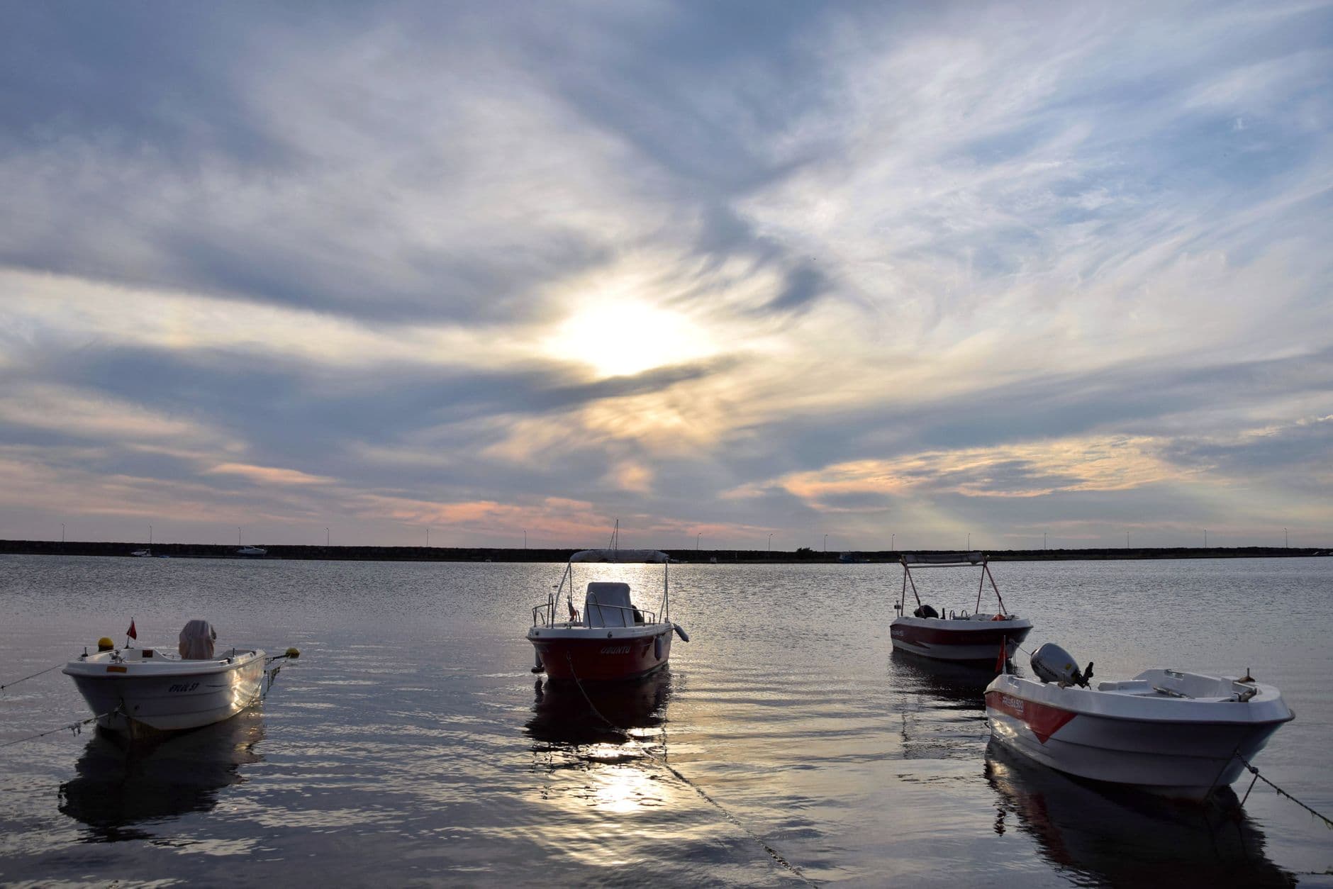 Boat harbor sunset